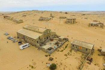 Deserted buildings at Kolmanskop ghost town, Namibia