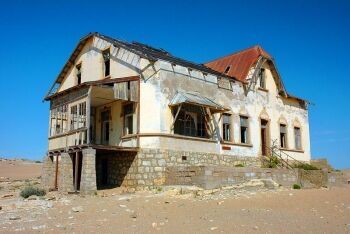 Deserted building at Kolmanskop ghost town, Namibia